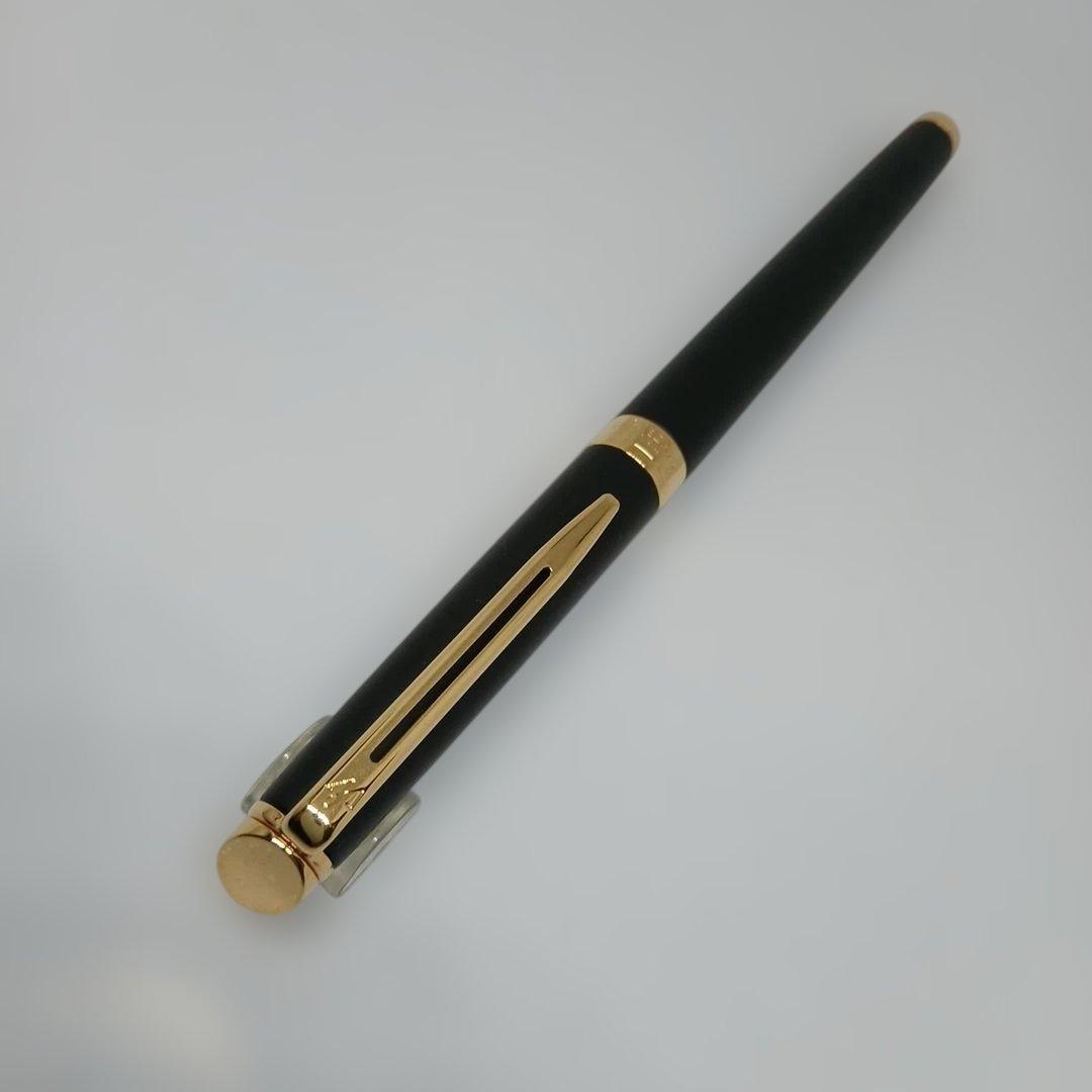 Waterman Matte Black Fountain Pen with fine nib and metal body displayed with case and instruction manual
