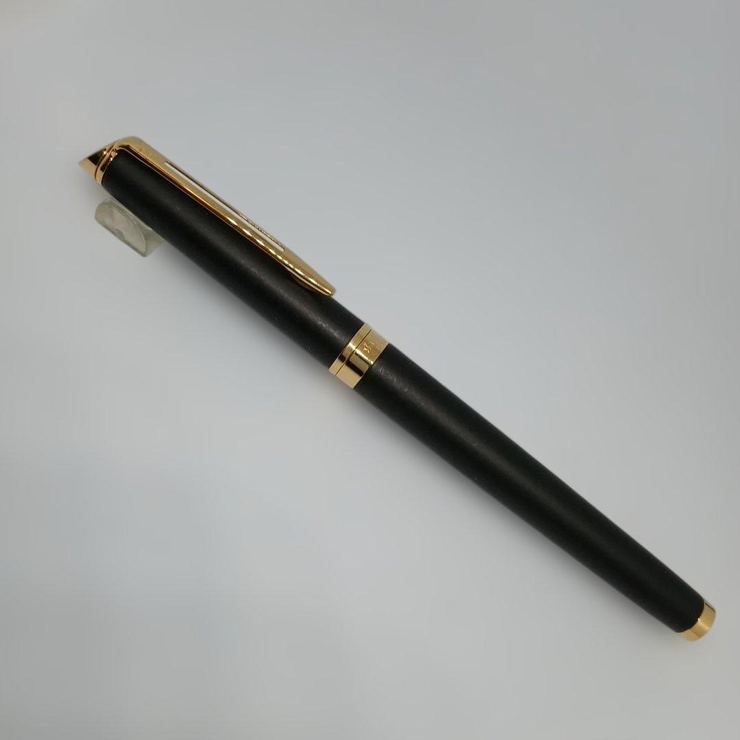 Waterman Matte Black Fountain Pen with fine nib and metal body displayed with case and instruction manual