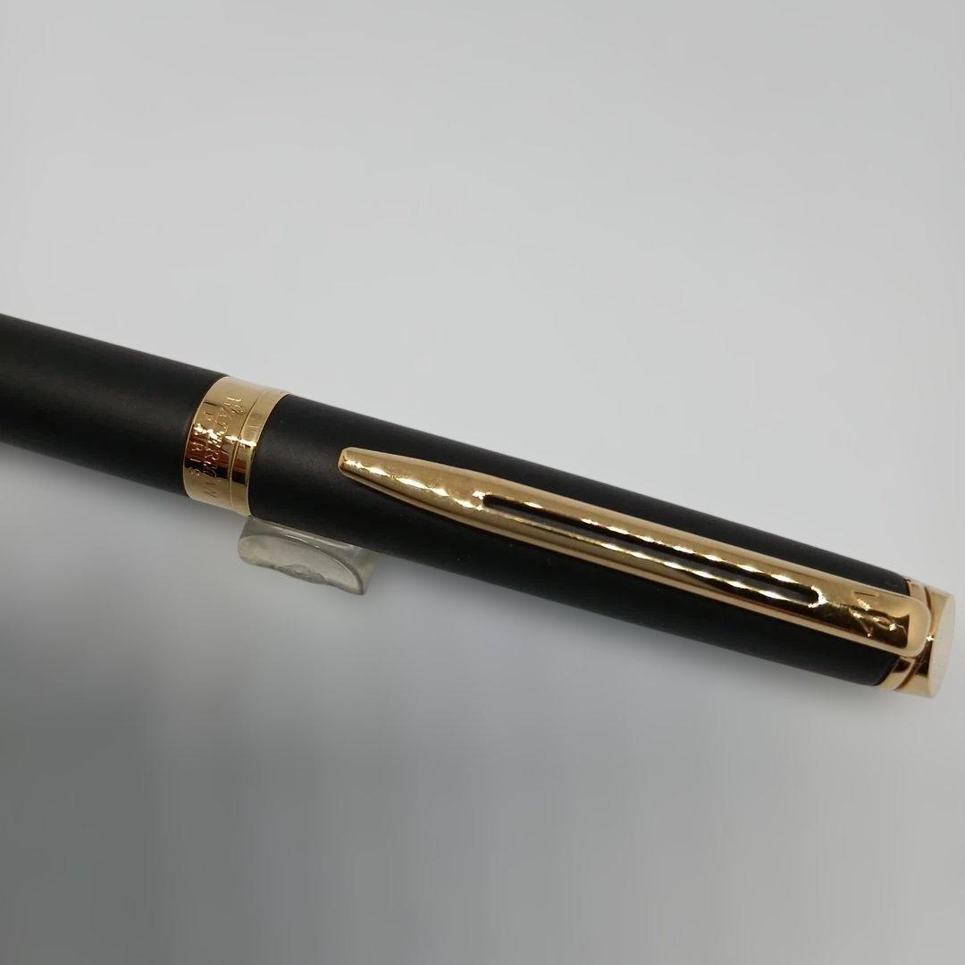 Waterman Matte Black Fountain Pen with fine nib and metal body displayed with case and instruction manual