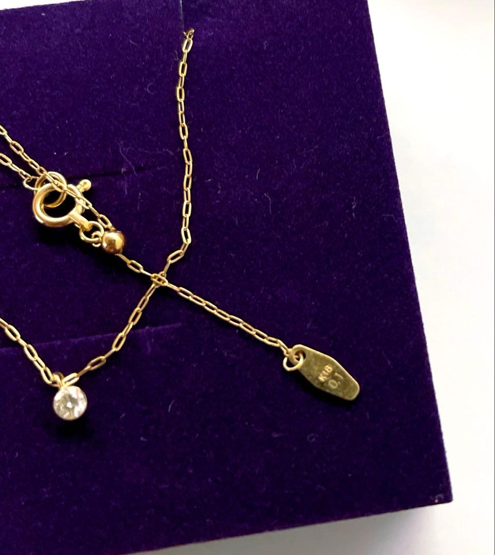 Agete necklace in yellow gold K18 with 0.1 carat diamond and mystery setting displayed on white background
