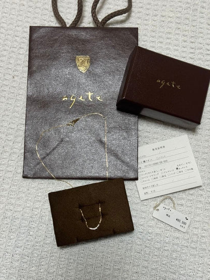 Agete K18 necklace with 0.04 carat diamond pendant in 18 karat gold