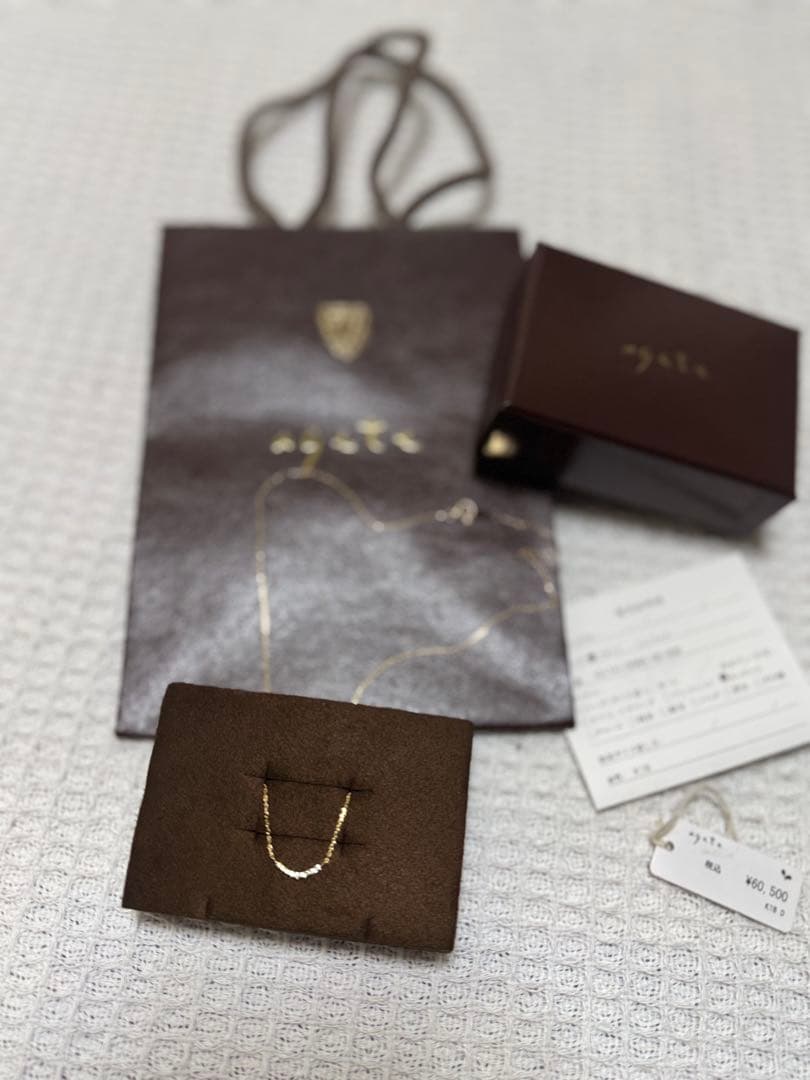 Agete K18 necklace with 0.04 carat diamond pendant in 18 karat gold