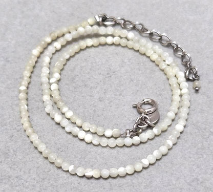 Agete Pearl Silver Necklace 42733 with 41cm length, featuring pearls on a silver chain, shown against white background