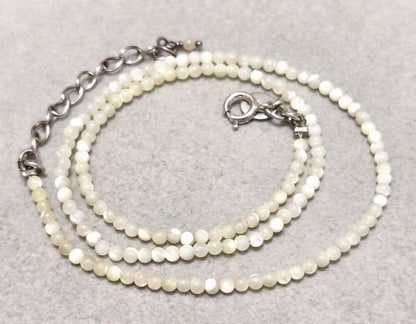 Agete Pearl Silver Necklace 42733 with 41cm length, featuring pearls on a silver chain, shown against white background