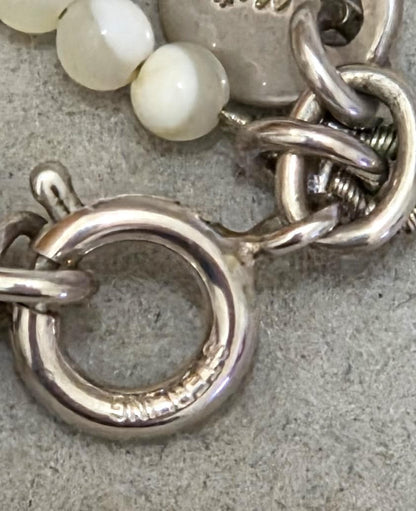 Agete Pearl Silver Necklace 42733 with 41cm length, featuring pearls on a silver chain, shown against white background
