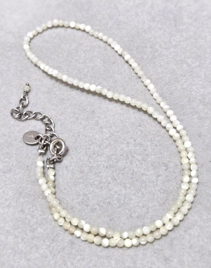 Agete Pearl Silver Necklace 42733 with 41cm length, featuring pearls on a silver chain, shown against white background