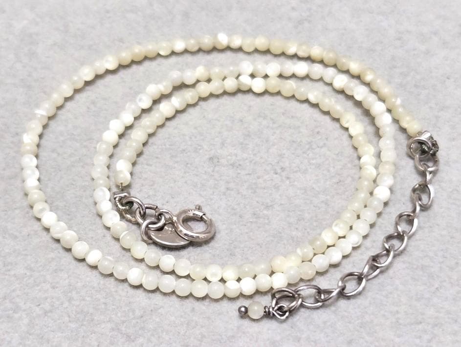 Agete Pearl Silver Necklace 42733 with 41cm length, featuring pearls on a silver chain, shown against white background