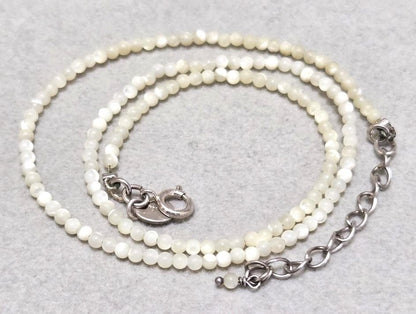 Agete Pearl Silver Necklace 42733 with 41cm length, featuring pearls on a silver chain, shown against white background