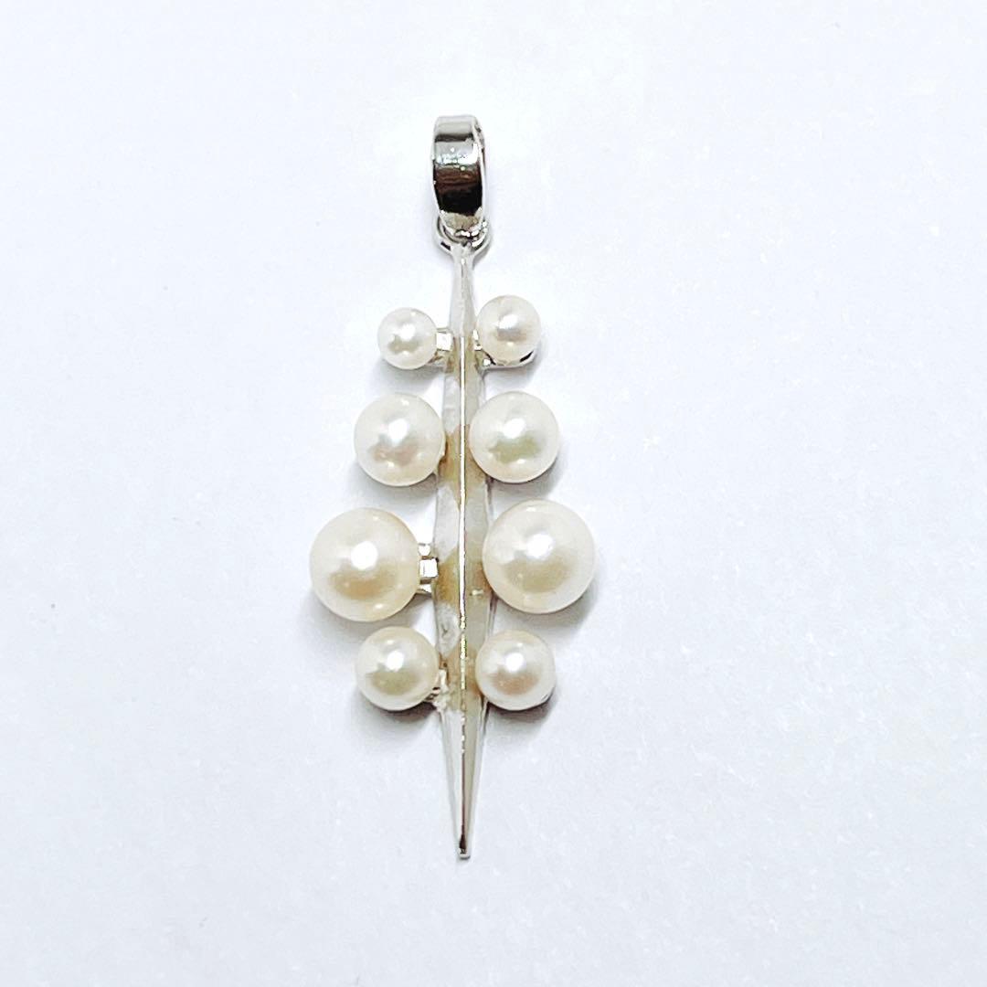 Mikimoto baby pearl necklace pendant top with silver chain and pearls sized 2.4 to 4.5 mm