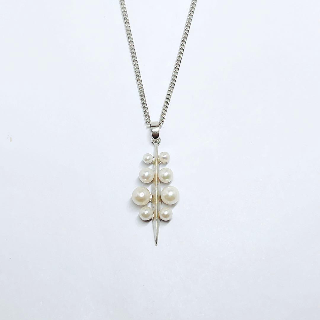 Mikimoto baby pearl necklace pendant top with silver chain and pearls sized 2.4 to 4.5 mm