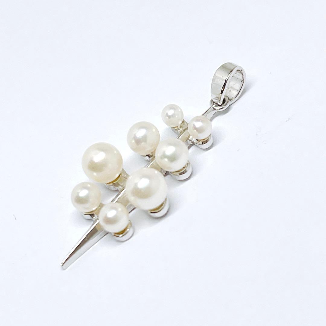 Mikimoto baby pearl necklace pendant top with silver chain and pearls sized 2.4 to 4.5 mm