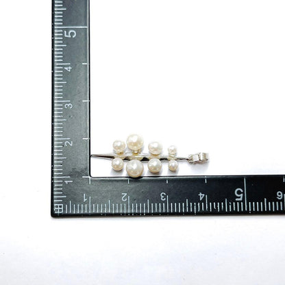 Mikimoto baby pearl necklace pendant top with silver chain and pearls sized 2.4 to 4.5 mm