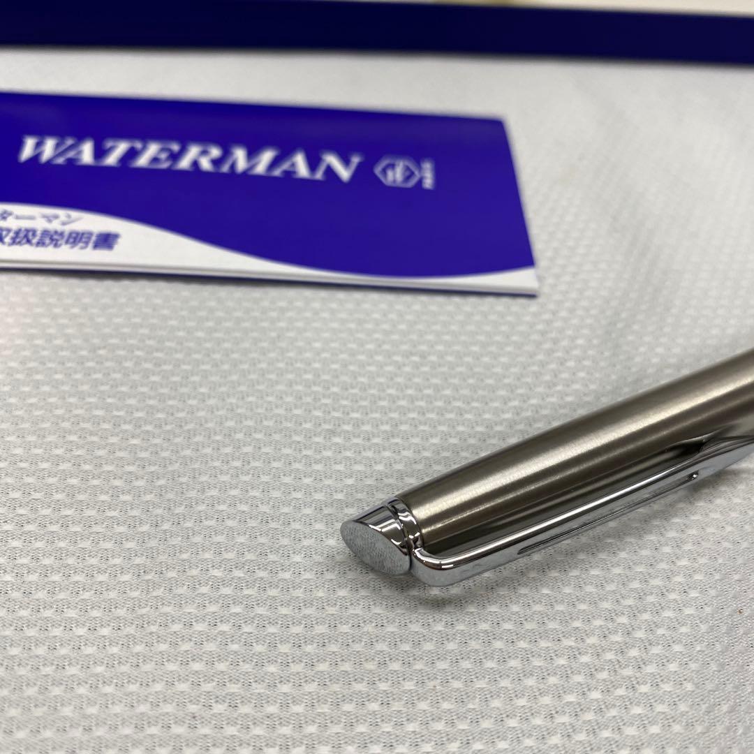 Waterman ballpoint pen made of metal showing signs of aging with included protective case