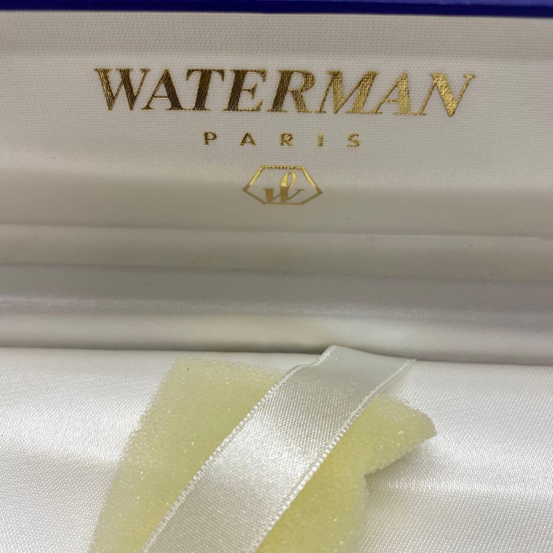 Waterman ballpoint pen made of metal showing signs of aging with included protective case