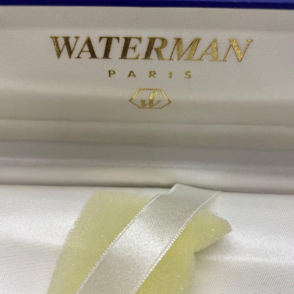 Waterman ballpoint pen made of metal showing signs of aging with included protective case