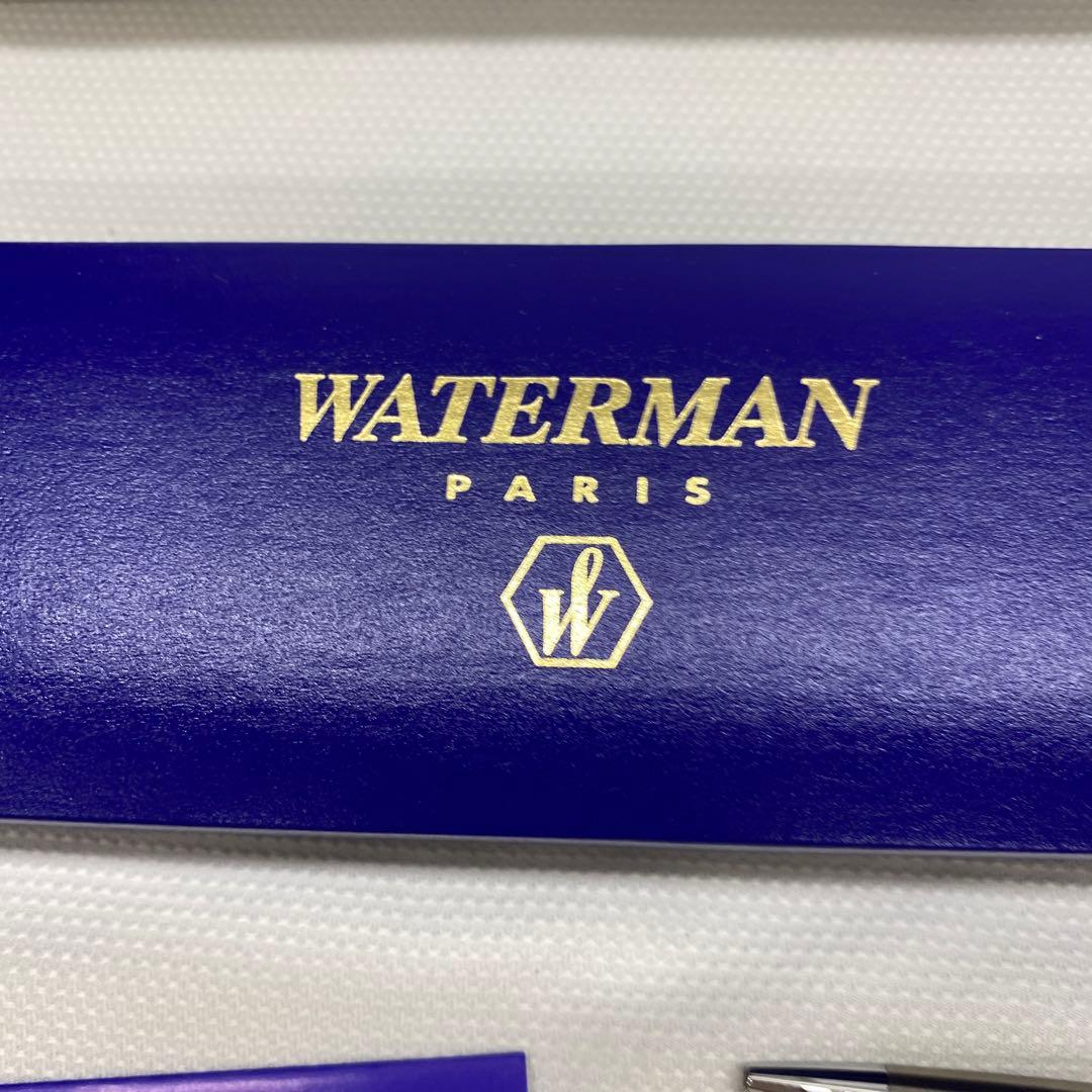 Waterman ballpoint pen made of metal showing signs of aging with included protective case