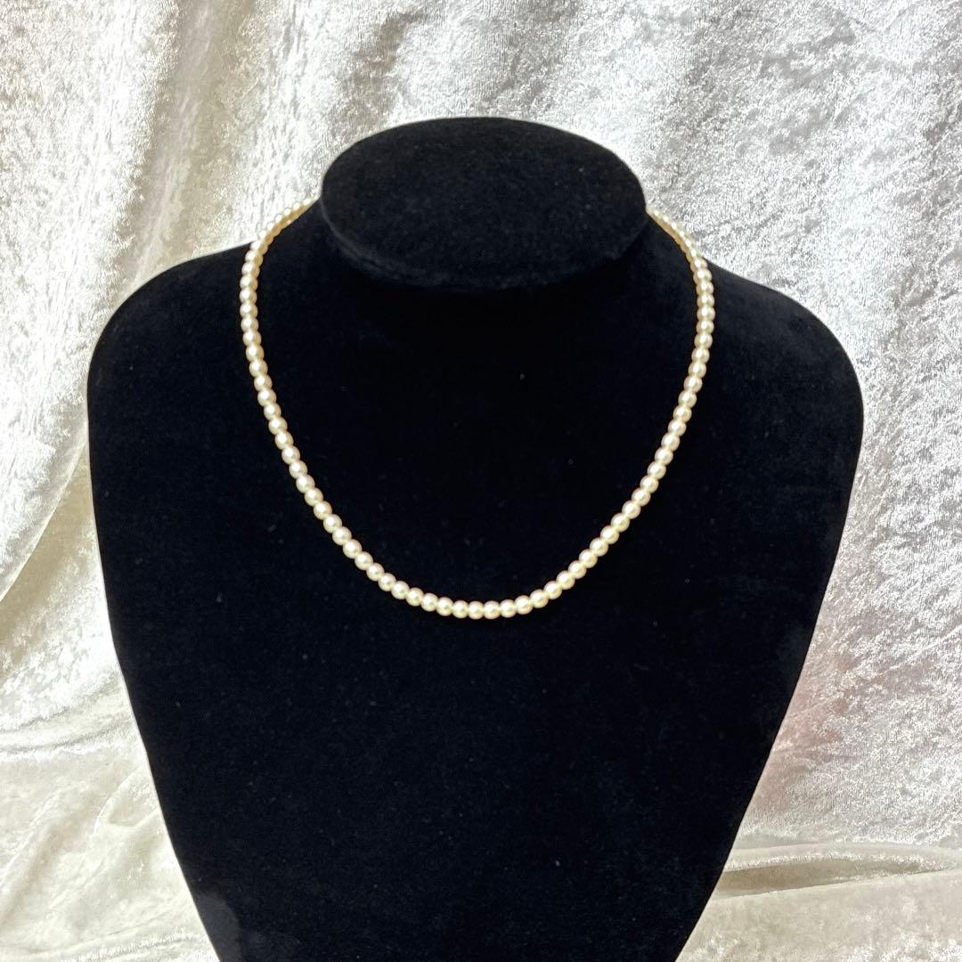 TASAKI pearl necklace with diamond charm in 18K gold, 39.5 cm length, displayed on white background