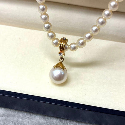 TASAKI pearl necklace with diamond charm in 18K gold, 39.5 cm length, displayed on white background