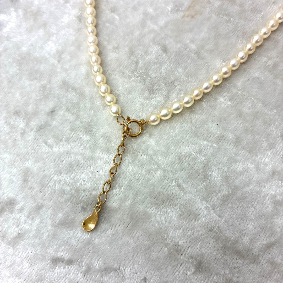 TASAKI pearl necklace with diamond charm in 18K gold, 39.5 cm length, displayed on white background