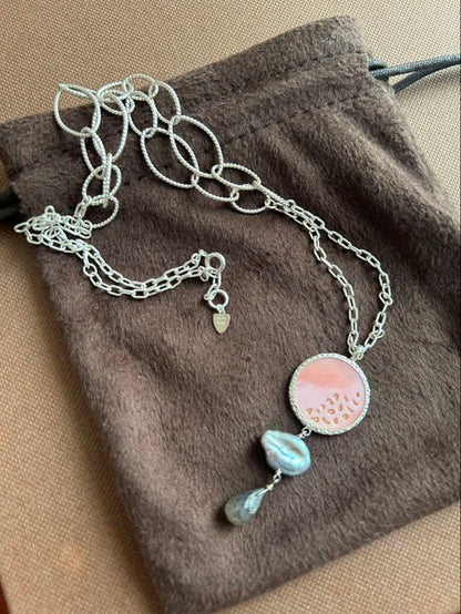 Agete silver necklace with 5 charms including pink stone, gray pearl, and labradorite on a 50cm chain