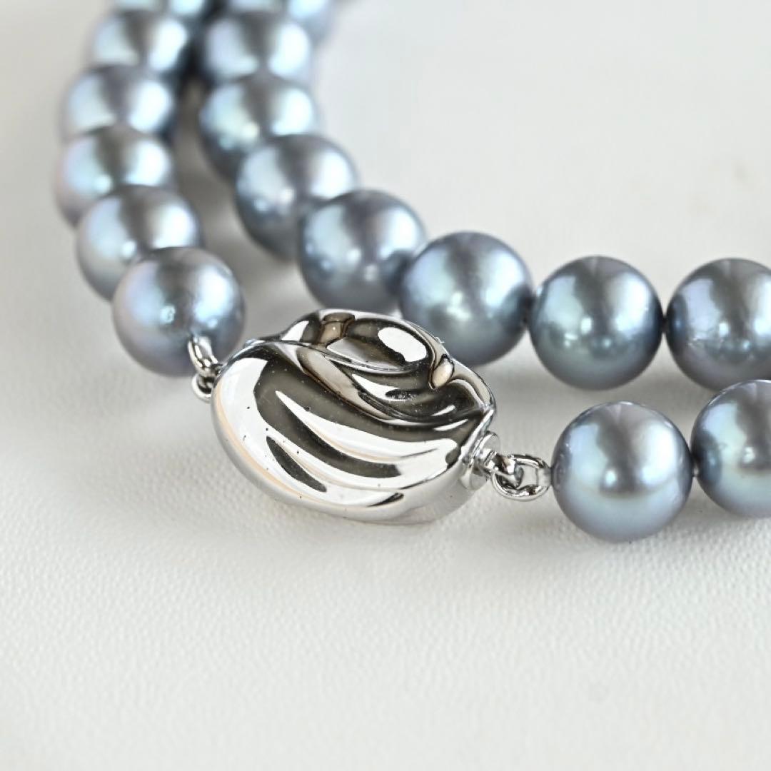 Swanklassup Tasaki Akoya natural blue pearl necklace with 7.5mm pearls displayed on white background
