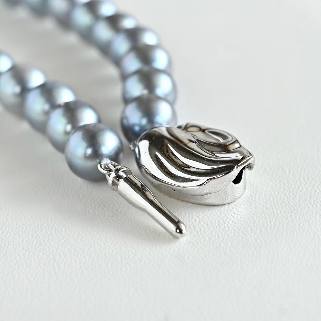Swanklassup Tasaki Akoya natural blue pearl necklace with 7.5mm pearls displayed on white background