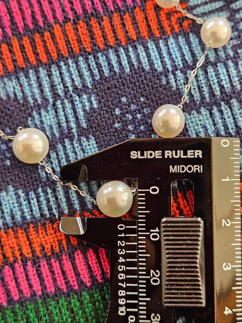 New unused Pt950 Akoya pearl station necklace approximately 70cm length with 4.5 to 8.5mm pearls