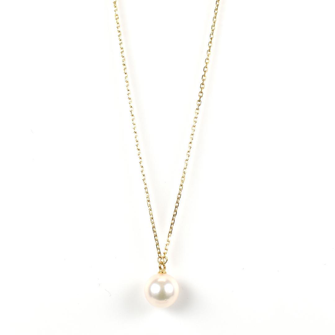 Mikimoto necklace with single 7mm Akoya pearl on 18K yellow gold chain, 40cm length, Mikimoto engraving visible