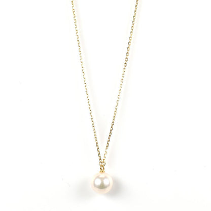 Mikimoto necklace with single 7mm Akoya pearl on 18K yellow gold chain, 40cm length, Mikimoto engraving visible