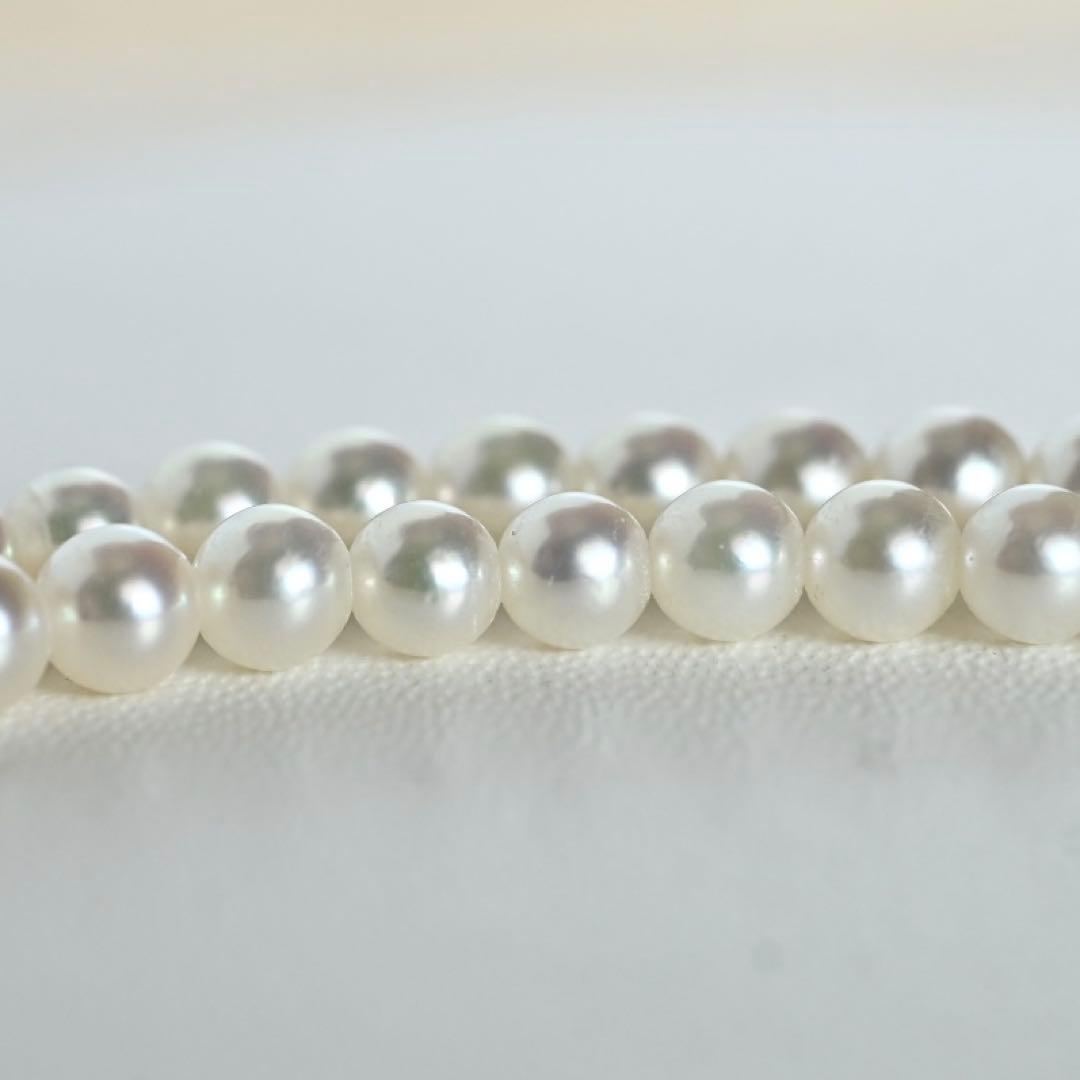 Mikimoto Akoya pearl necklace with round baby pearls on 18-karat yellow gold chain, 36cm length