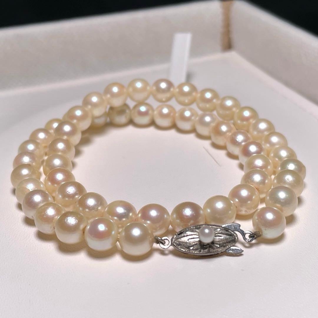 Akoya pearl necklace with 7.0 to 7.5 mm round white pearls, 37.8 cm length, featuring silver imprint