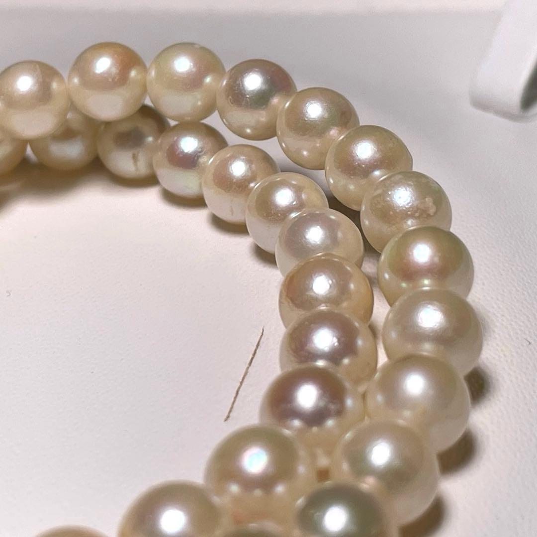 Akoya pearl necklace with 7.0 to 7.5 mm round white pearls, 37.8 cm length, featuring silver imprint