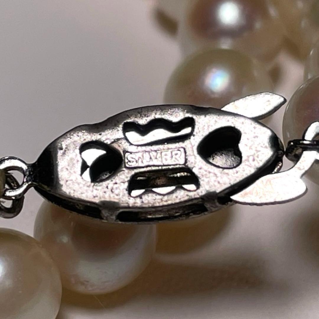 Akoya pearl necklace with 7.0 to 7.5 mm round white pearls, 37.8 cm length, featuring silver imprint