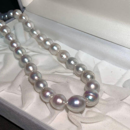 White butterfly pearl necklace with 9-12mm pearls and a silver clasp displayed on a white background