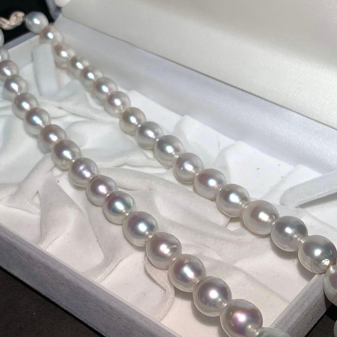 White butterfly pearl necklace with 9-12mm pearls and a silver clasp displayed on a white background