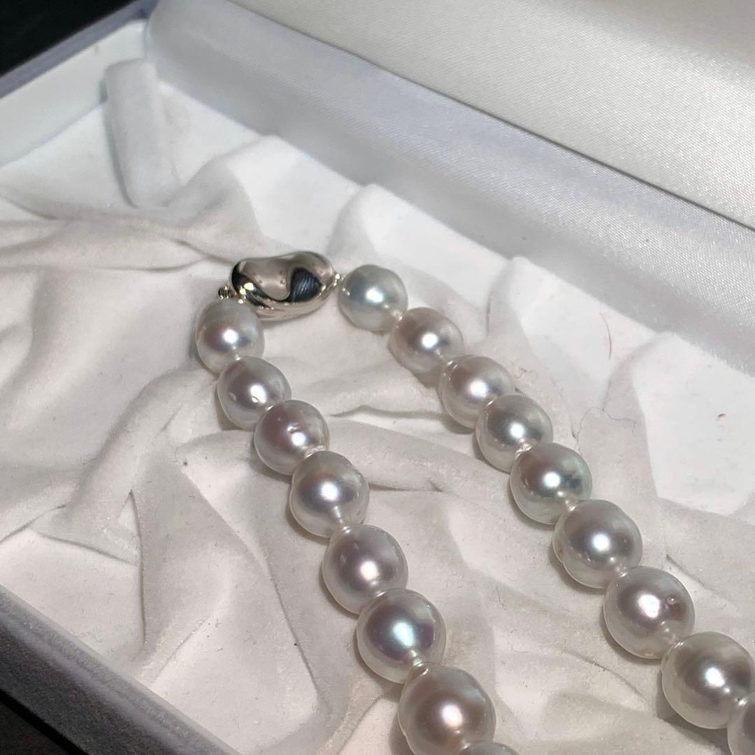 White butterfly pearl necklace with 9-12mm pearls and a silver clasp displayed on a white background