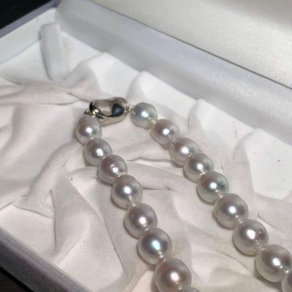 White butterfly pearl necklace with 9-12mm pearls and a silver clasp displayed on a white background