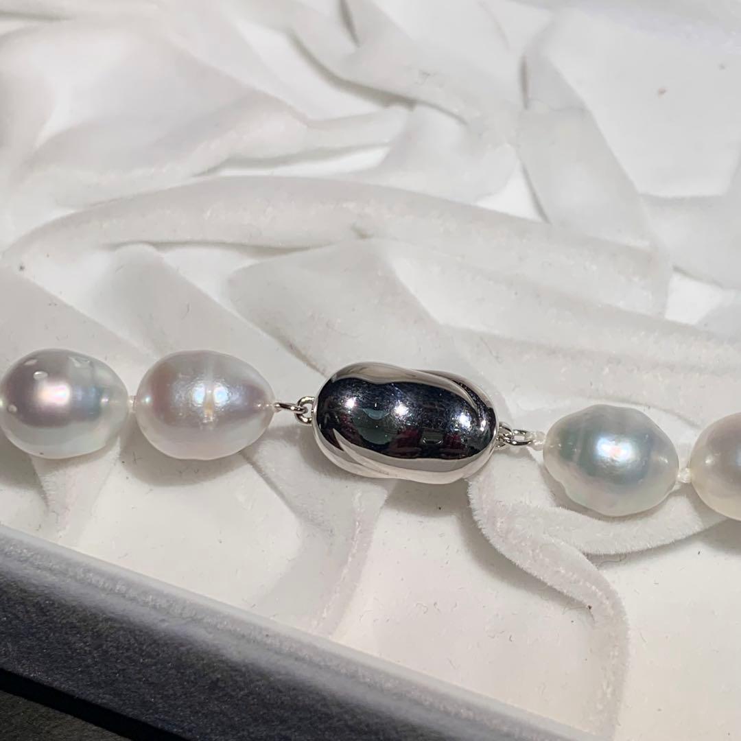 White butterfly pearl necklace with 9-12mm pearls and a silver clasp displayed on a white background