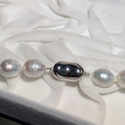 White butterfly pearl necklace with 9-12mm pearls and a silver clasp displayed on a white background