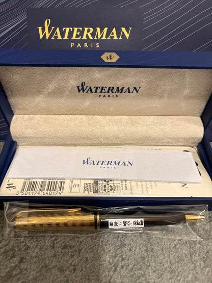 Waterman black and gold ballpoint pen with gold cap, included case and paper bag