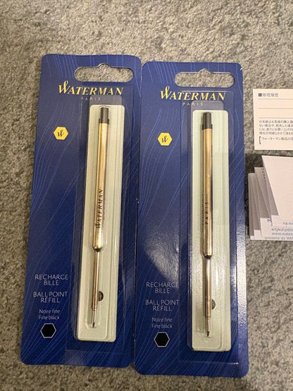 Waterman black and gold ballpoint pen with gold cap, included case and paper bag