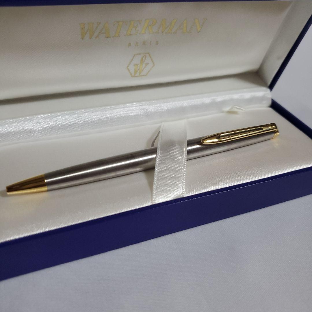 Unused WATERMAN ballpoint pen with original box showing some dirt on cover