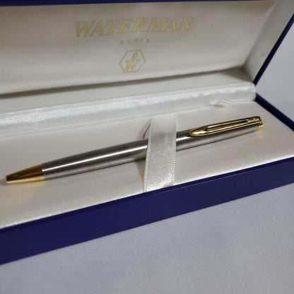 Unused WATERMAN ballpoint pen with original box showing some dirt on cover