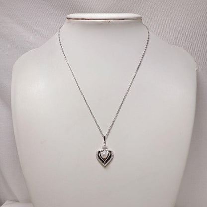 MIKIMOTO Silver necklace featuring a single pearl in a heart-shaped pendant with a 40.5 cm chain