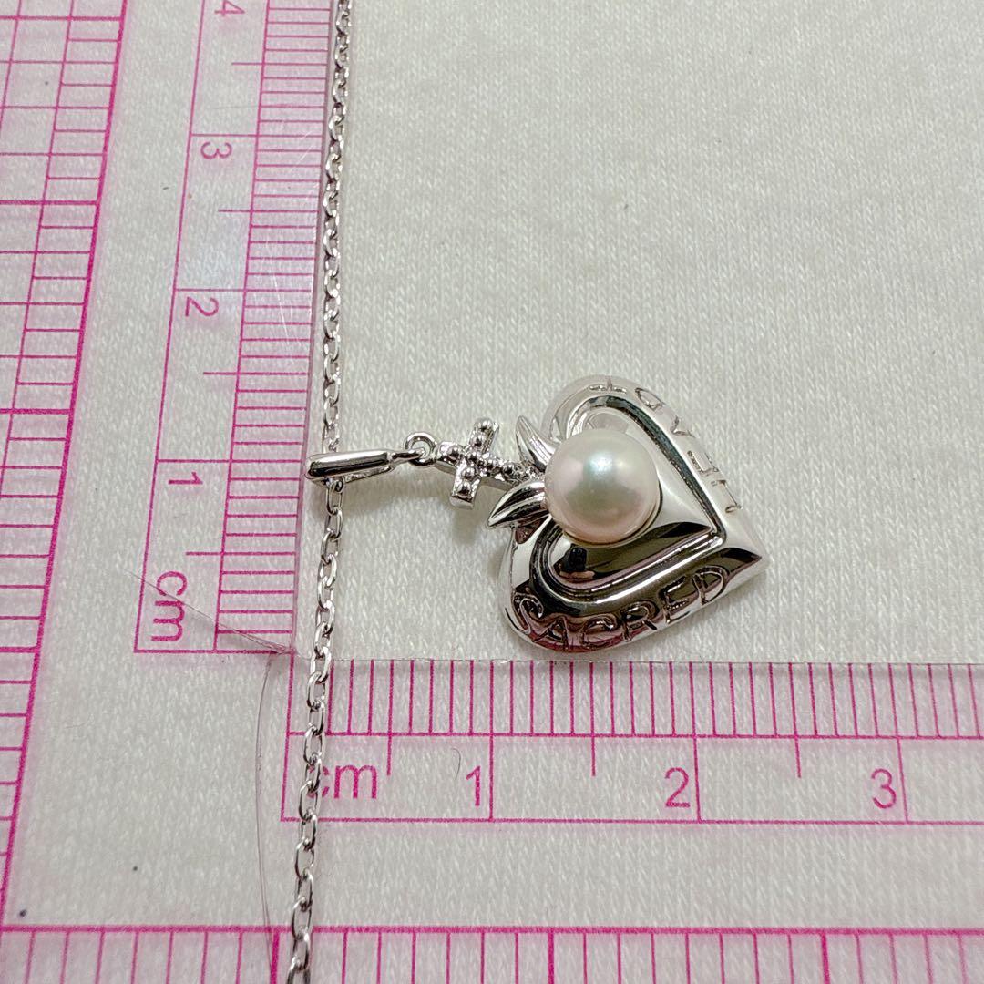 MIKIMOTO Silver necklace featuring a single pearl in a heart-shaped pendant with a 40.5 cm chain