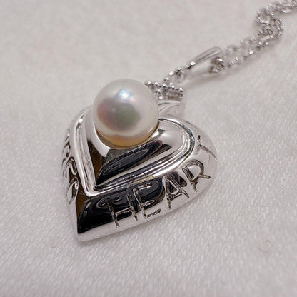 MIKIMOTO Silver necklace featuring a single pearl in a heart-shaped pendant with a 40.5 cm chain