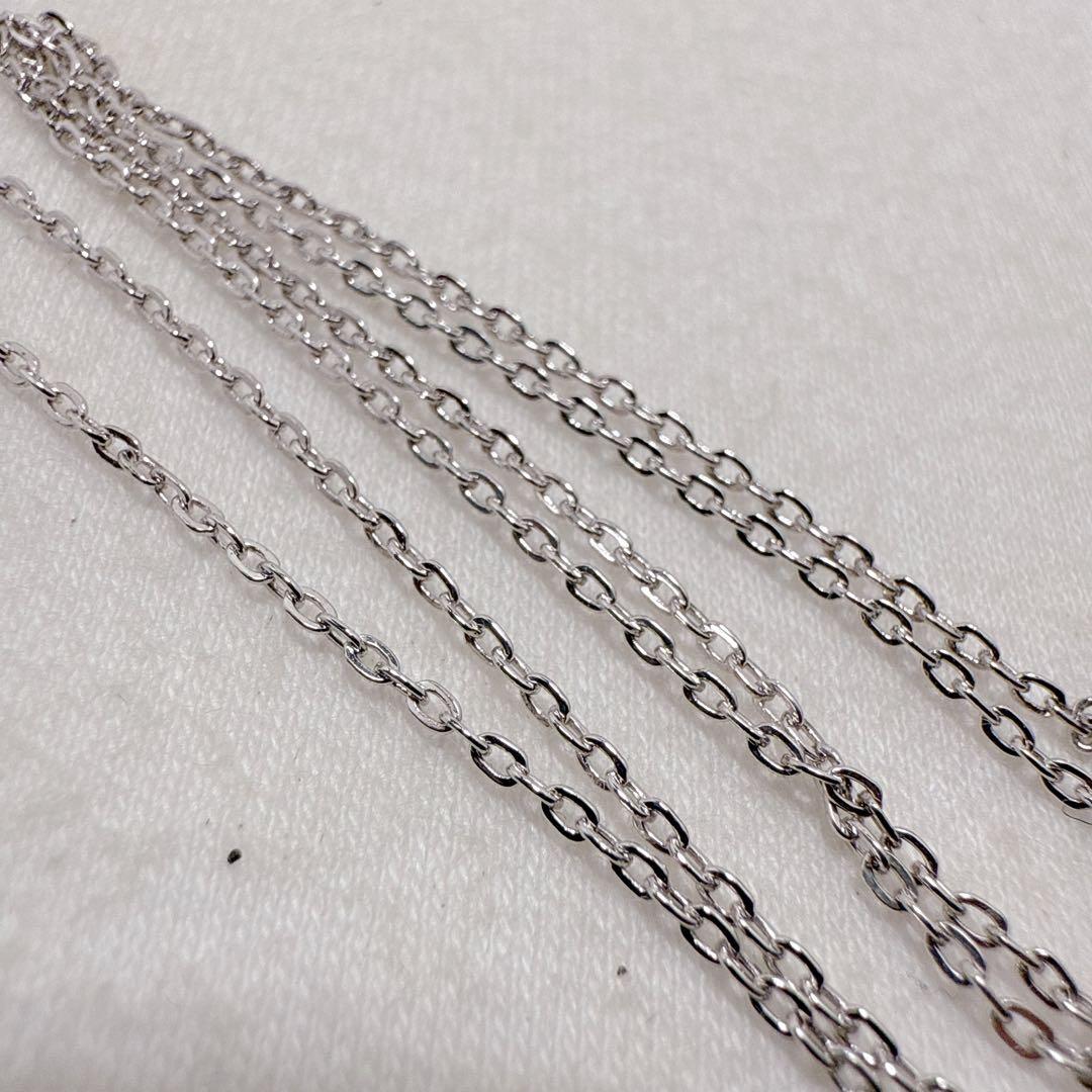 MIKIMOTO Silver necklace featuring a single pearl in a heart-shaped pendant with a 40.5 cm chain