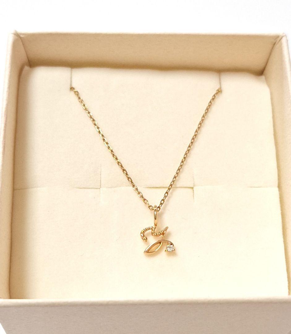 Agete K10 yellow gold necklace with diamond initial Y pendant on a fine chain