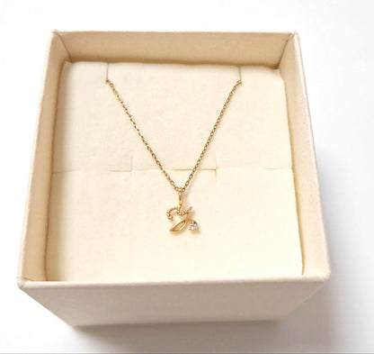 Agete K10 yellow gold necklace with diamond initial Y pendant on a fine chain