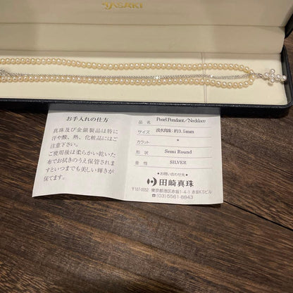 Tasaki Pearl Baby Pearl Necklace Set in silver featuring one-string pearl necklace and adjustable pearl cross necklace chain
